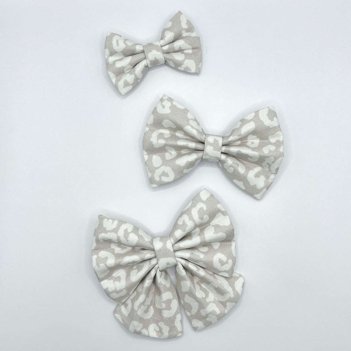 Ivory Leopard Bows